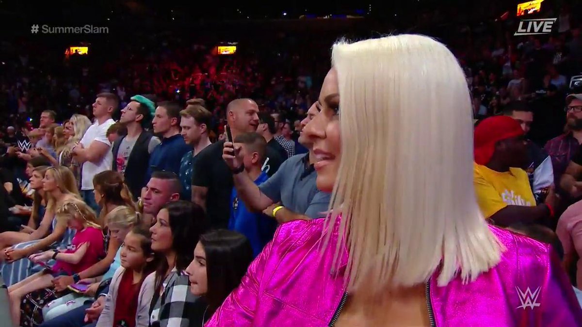 A proud <a href="/MaryseMizanin/">Maryse Mizanin</a> is looking on at ringside LIVE on <a href="/WWENetwork/">WWE Network</a> for <a href="/mikethemiz/">The Miz</a> vs. @WWEDanielBryan RIGHT NOW at #SummerSlam!