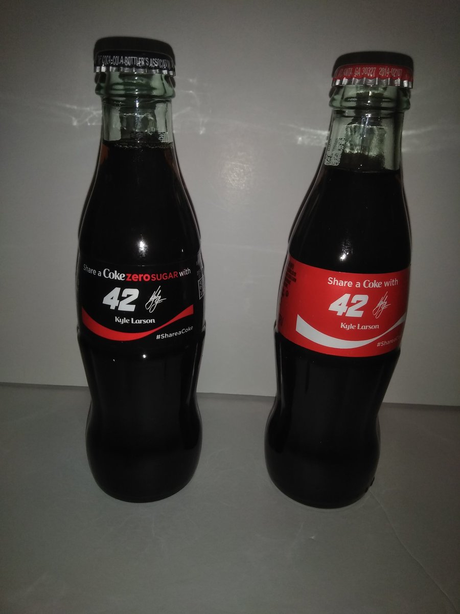 DiggingDog13's tweet photo. @CGRTeams my 2 custom Coke bottles! My 2 team trophy champagne! And a Coke that Davis gave me that @KyleLarsonRacin walked out with during intros at Michigan speedway! #OneGanassi #Cokebaby #hugecollection https://t.co/NJbJoPHcSE