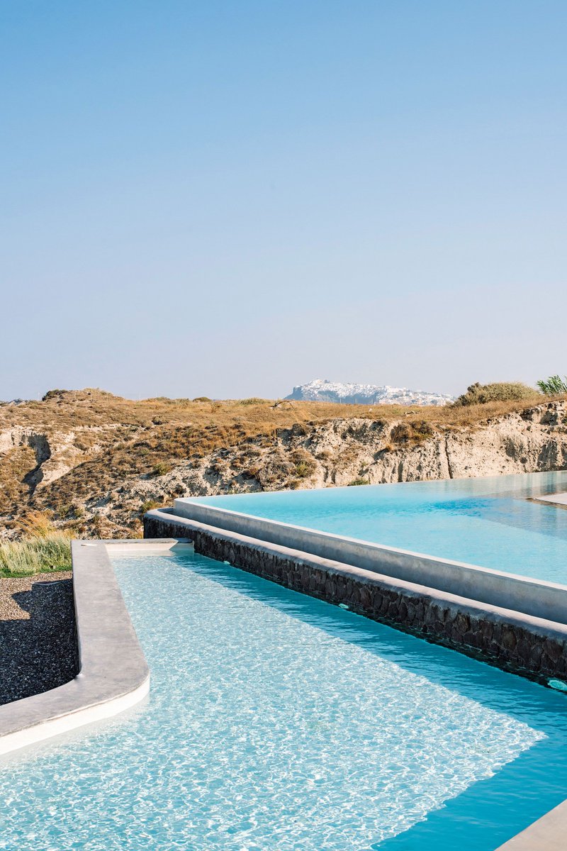 cntraveller's tweet image. #MondayBlues from the tiered pool terrace at @erosantorini, where the main event is watching the sun slip into the Aegean. #infinitypool #pooloftheweek buff.ly/2MZmjD6