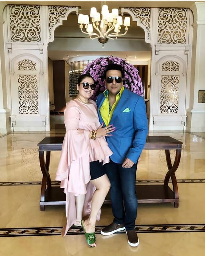 Govinda and his wife pose for a lovely pic together! 
#Govinda #SunitaAhuja #Bollywood #LoveBirds #Fashion #tadkabollywood