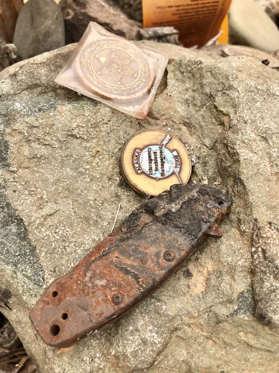wapio3021's tweet photo. Three years ago today 3 firefighters were killed fighting the #TwispRiverFire. Tonight we return to the memorial to honor and remember. Many personal effects including hose coupling, pocket knife and melted remains of their fire truck. #lodd @ForestServiceNW @northwestfires https://t.co/P7ScOWk5Zk