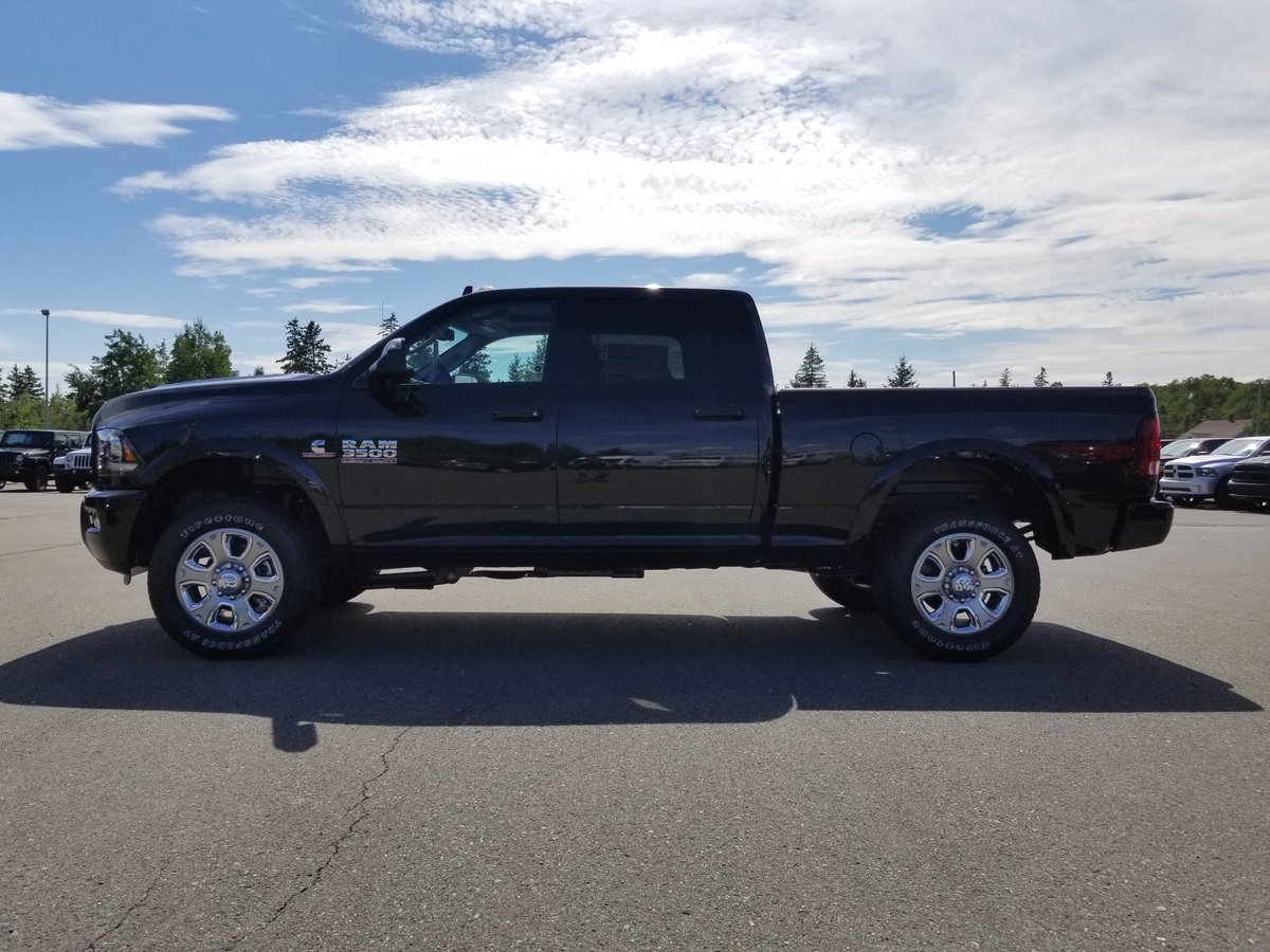 macdchrysler's tweet photo. 2018 Ram 3500 Laramie Sport Crew Cab in Brilliant Black Crystal Pearl equipped with the 6.7L Cummins I-6 Turbo Diesel &amp; 6-Speed Automatic, Leather-Faced Vented Bucket Seats, Sport Appearance Package, Power Sunroof, Uconnect 4C &amp; Rear Auto-Leveling Air Suspension #RamTrucks https://t.co/7RXLJuFAf0