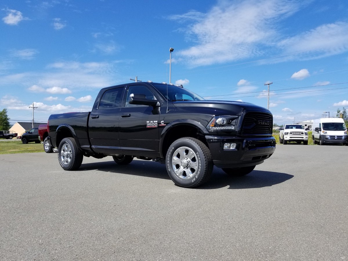 macdchrysler's tweet photo. 2018 Ram 3500 Laramie Sport Crew Cab in Brilliant Black Crystal Pearl equipped with the 6.7L Cummins I-6 Turbo Diesel &amp; 6-Speed Automatic, Leather-Faced Vented Bucket Seats, Sport Appearance Package, Power Sunroof, Uconnect 4C &amp; Rear Auto-Leveling Air Suspension #RamTrucks https://t.co/7RXLJuFAf0