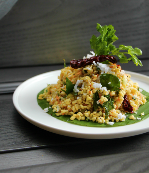 Hesaru Bele Kosambari is a light crunchy salad of
yellow moong (split green gram) with fresh coconut, carrot and
cucumber, tempered with dry red chili, mustard and hing. #oota #salads #ootabangalore