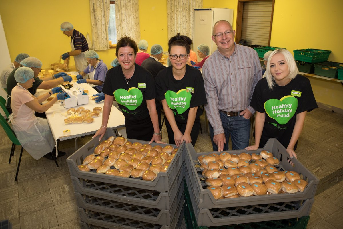 asda's tweet photo. Our stores’ community champions have been helping more children stay healthy, well fed and active during the holidays – like Christine, Kayleigh and Carolina, who’ve been helping @UrbanOutreachUK make and give out thousands of packed lunches: https://t.co/wJ0eR0q2SQ https://t.co/JyINGItkoW