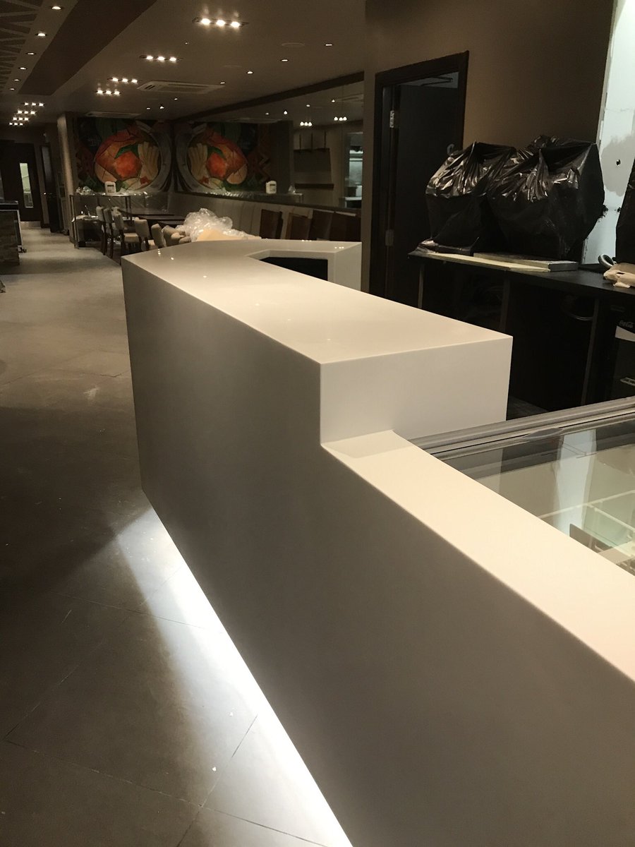 Stunning bar out of #avonitesurfaces fabricated by ourselves in porcelain white