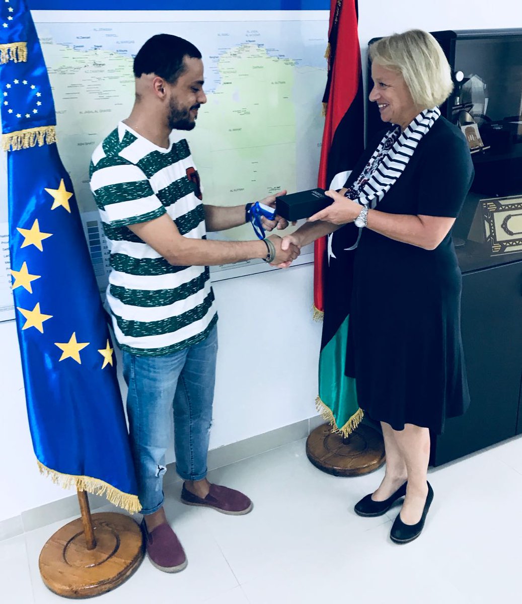 EUinLibya's tweet photo. Farouk Ashour received Friday the 1st prize (smartphone) from EU Ambassador Bettina Muscheidt for winning the EU Photo Contest Shoot &amp; Share. Congratulations!

His winning photo is shown here. 
#Libya #EU #EU4YOUth #neighbours #photo https://t.co/OXhlWCqwJV
