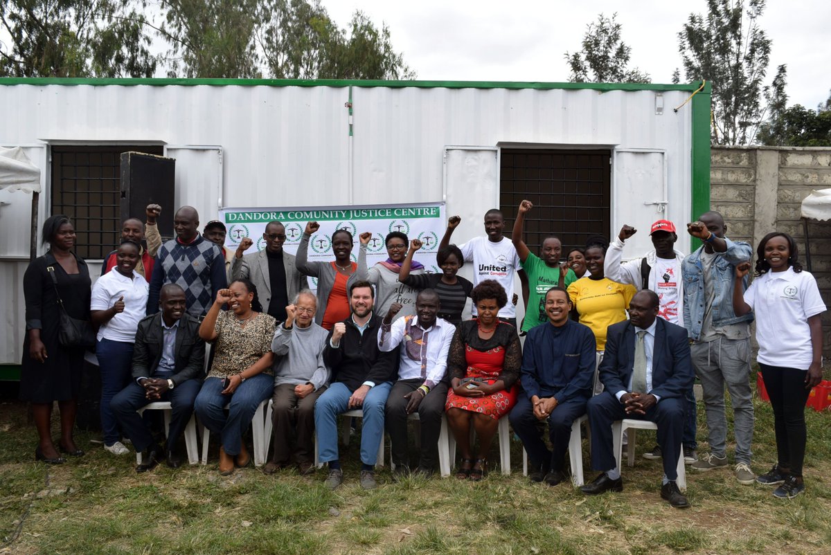 IJMKenya's tweet photo. Members of @DandoraJustice pose for a photo with partners, area MCA, Ward Administrator and Dandora deputy OCS during the opening of Dandora Justice Centre office. The center will help area residents to document human rights violations and follow up cases #DandoraJusticeLaunch https://t.co/U9QXh4ztB0
