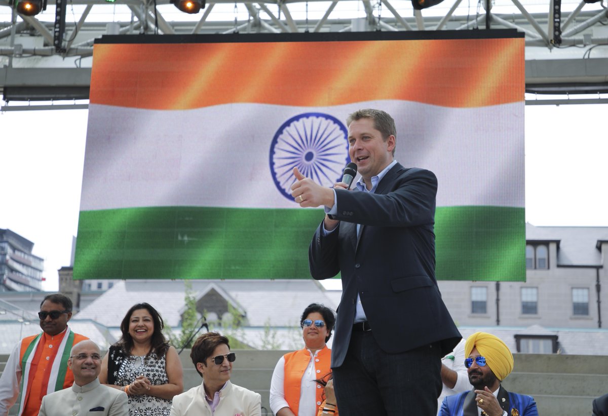 AndrewScheer's tweet photo. Celebrated Indian Independence Day with @IndiainToronto Consul General @dineshbhatia, @jimmysheirgill and Malkit Singh. Amazing to join in on events with the huge crowd in Nathan Phillips Square yesterday. https://t.co/82q3HBxH2t