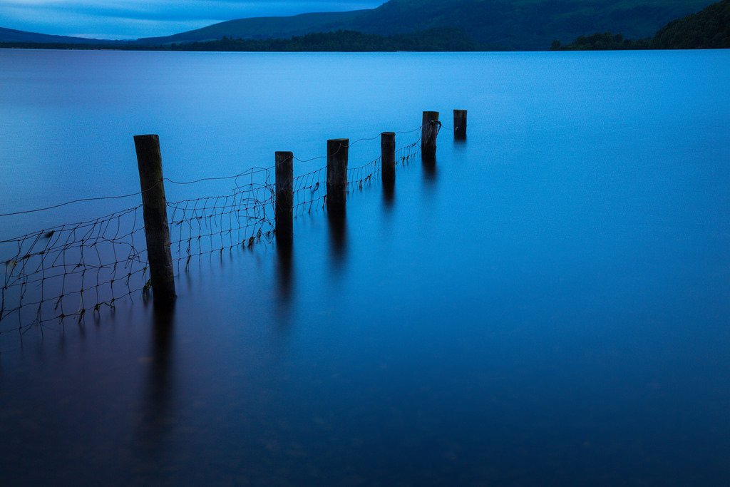lukasboesch's tweet photo. Blue Hour at Loch Lomond: The End of the Day is near and the Light is slowly fading away. Tranquility lies all over the Landscape and all over the Mind https://t.co/nwmp1xJl4Y