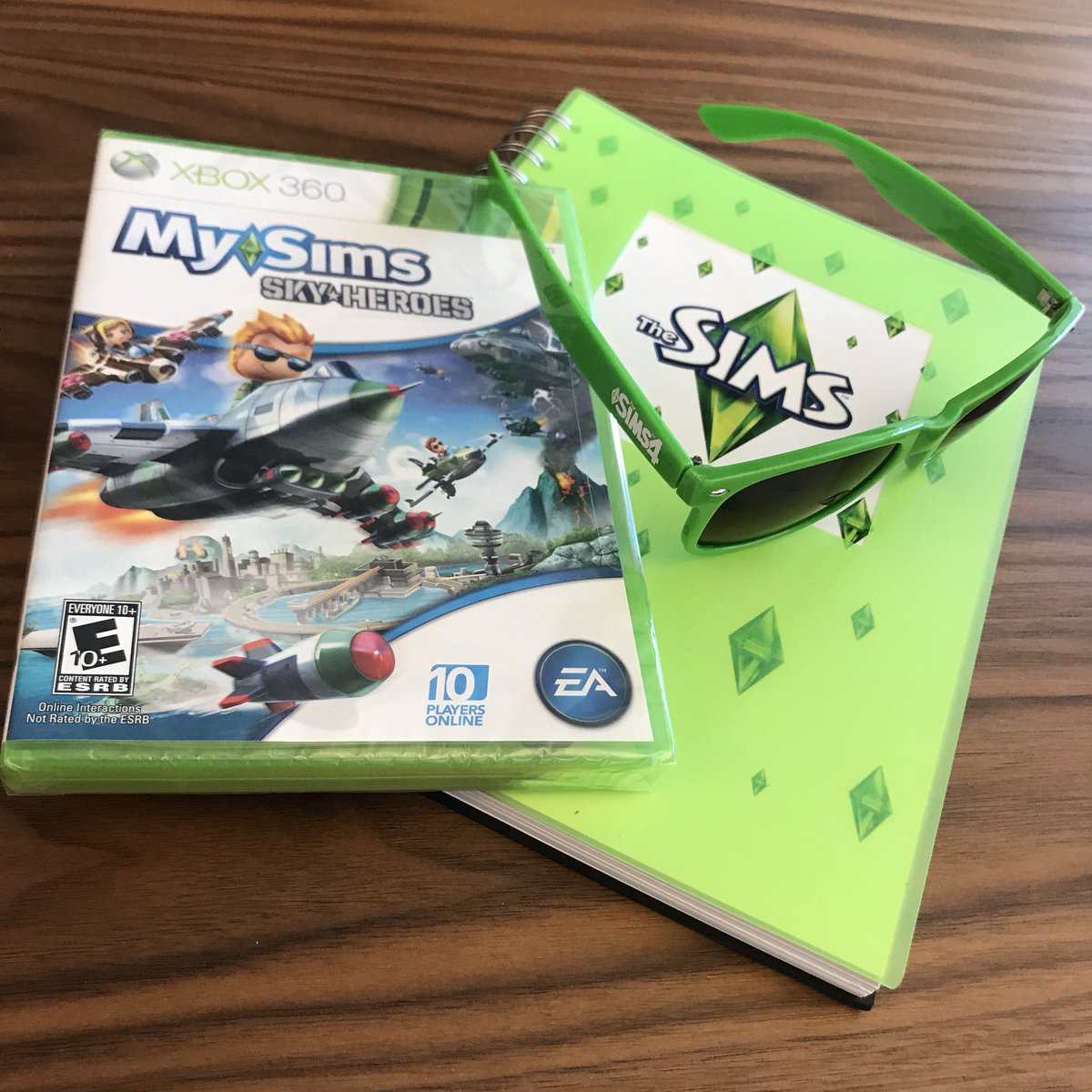 SimGuruKate's tweet photo. Was cleaning out the closet with @SimGuruFrost and found a bunch of old school swag so this week I am going to do some throwback giveaways! Retweet this tweet and follow me (so I can send you a DM if you win). Winner selected Wednesday, 8/22, at 10 AM PT. https://t.co/VbXqoaC8H2