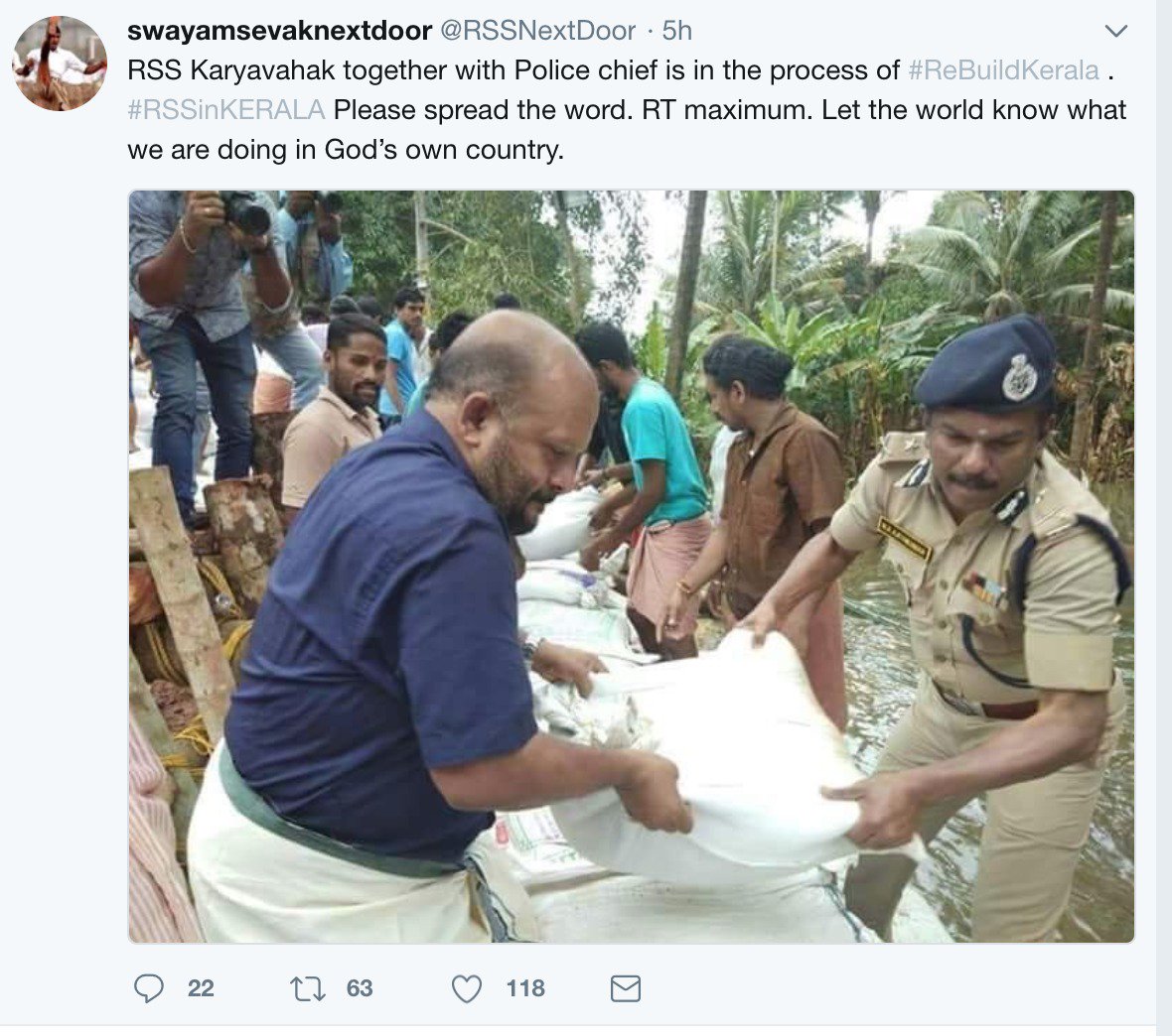 pratheesh's tweet photo. The man in the blue shirt is a Communist leader &amp; Kerala minister for Agriculture. He is a staunch critic of Sanghparivar. It is an insult for him. Seva bharati &amp; RSS did no relief work in Kerala. Now, they indulge in spreading lies about them and against Kerala. https://t.co/ASArgZdZWB