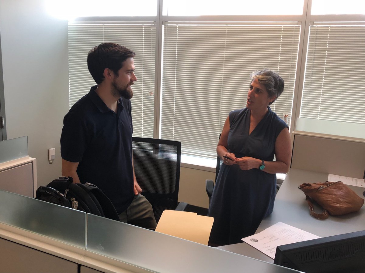 tomsherwood's tweet photo. At-large DC CoMem Elissa Silverman at Board of Elections (w/campaign manager Zach Weinstein) filing complaint that challenger Kathryn Allen’s signatures are riddled with fakes and errors. @kojoshow @wcp https://t.co/ypauN3duzs