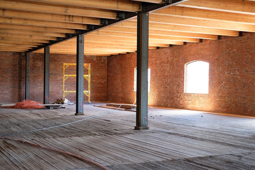 weinstein_au's tweet photo. A glimpse of the new exposed steel and heavy timber roof structure inside the landmarked Ainsworth &amp; Dunn Building. The adaptive re-use project is designed by #WeinsteinAU with construction by @WalshConstCo. 📷: @rio_namiki https://t.co/BpPM1l4MYN