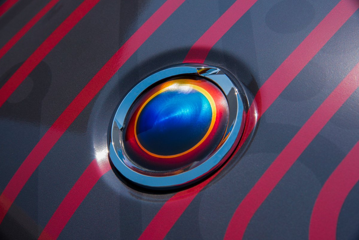 KarmaAutomotive's tweet photo. An artistic reflection of the Revero’s tech-heavy composition. #CrimsonCharged will be one of two Reveros participating in this week’s @FuelRun. Check back tomorrow to see the second exclusive wrap. #KarmaAuto #Revero #FuelRun2018 https://t.co/dFz5JmUzsF