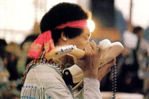 Classic Rock In Pics on Twitter: "Jimi Hendrix playing guitar with his teeth at Woodstock, 1969 https://t.co/zHmCu639lc" /