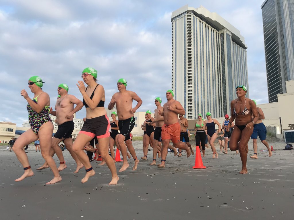 AmFisheriesSoc's tweet photo. #SpawningRun and first-ever Splash-n-Dash brought #fishsci peers to the pier and beach in Atlantic City #AFS148 @JimVasslides https://t.co/Uv47NhBAV4