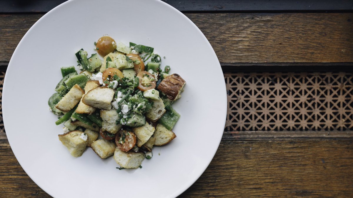 FishbonesBar's tweet image. Enjoy the sunshine with a patio lunch! Our feature is a panzanella Italian bread salad with peppers, tomato, and goat cheese. $15