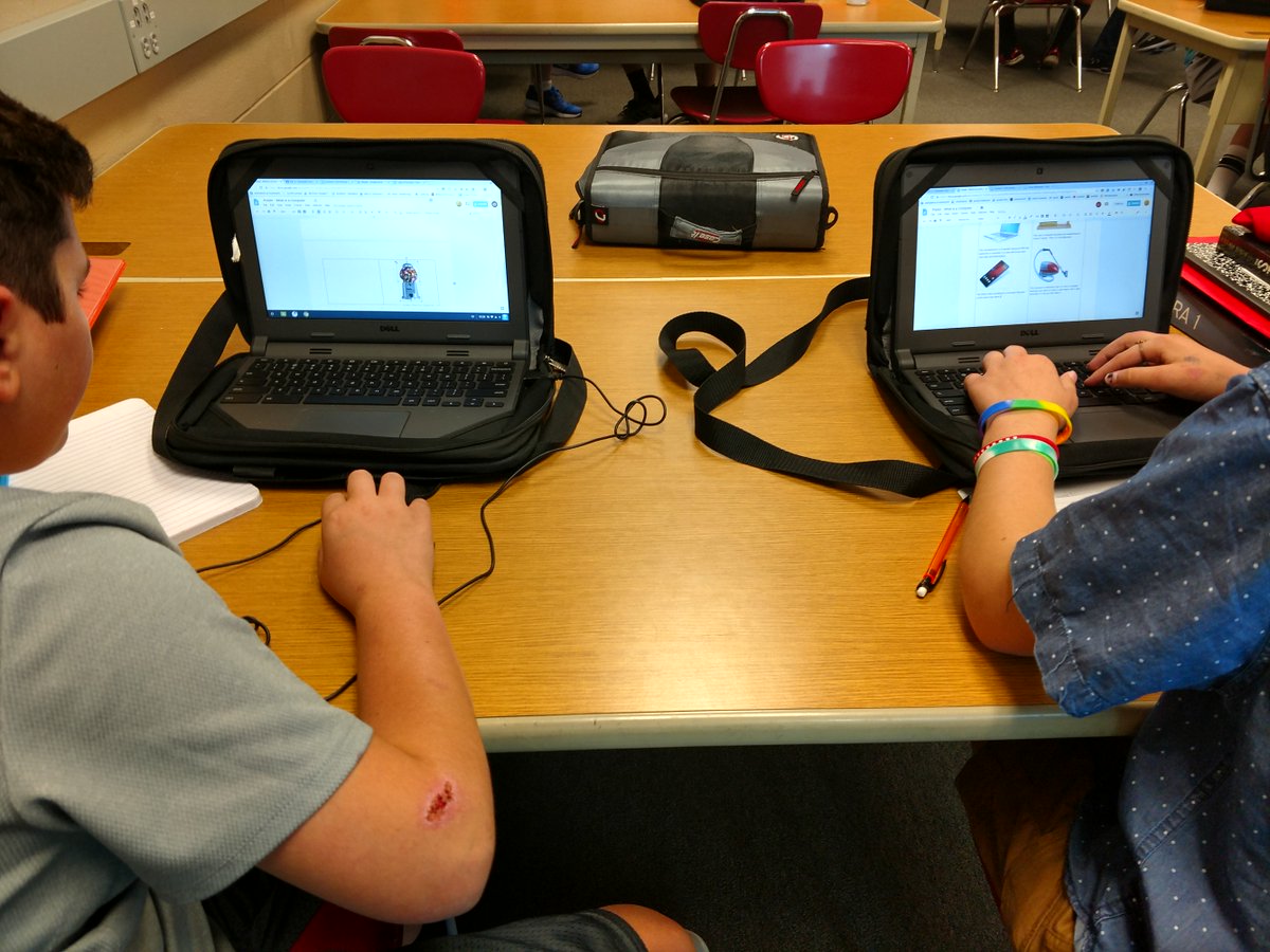 Students working together in a shared Google Doc to make digital "What is a computer?" posters in our coding class! <a href="/codeorg/">Code.org</a>
