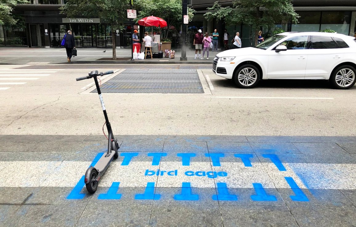 A couple of guys in Cincinnati chalk painted "bird cages" around the city to show how easy it could be to manage dockless e-scooter "clutter" #tacticalurbanism buildwithyard.com/blog/2018/8/15…