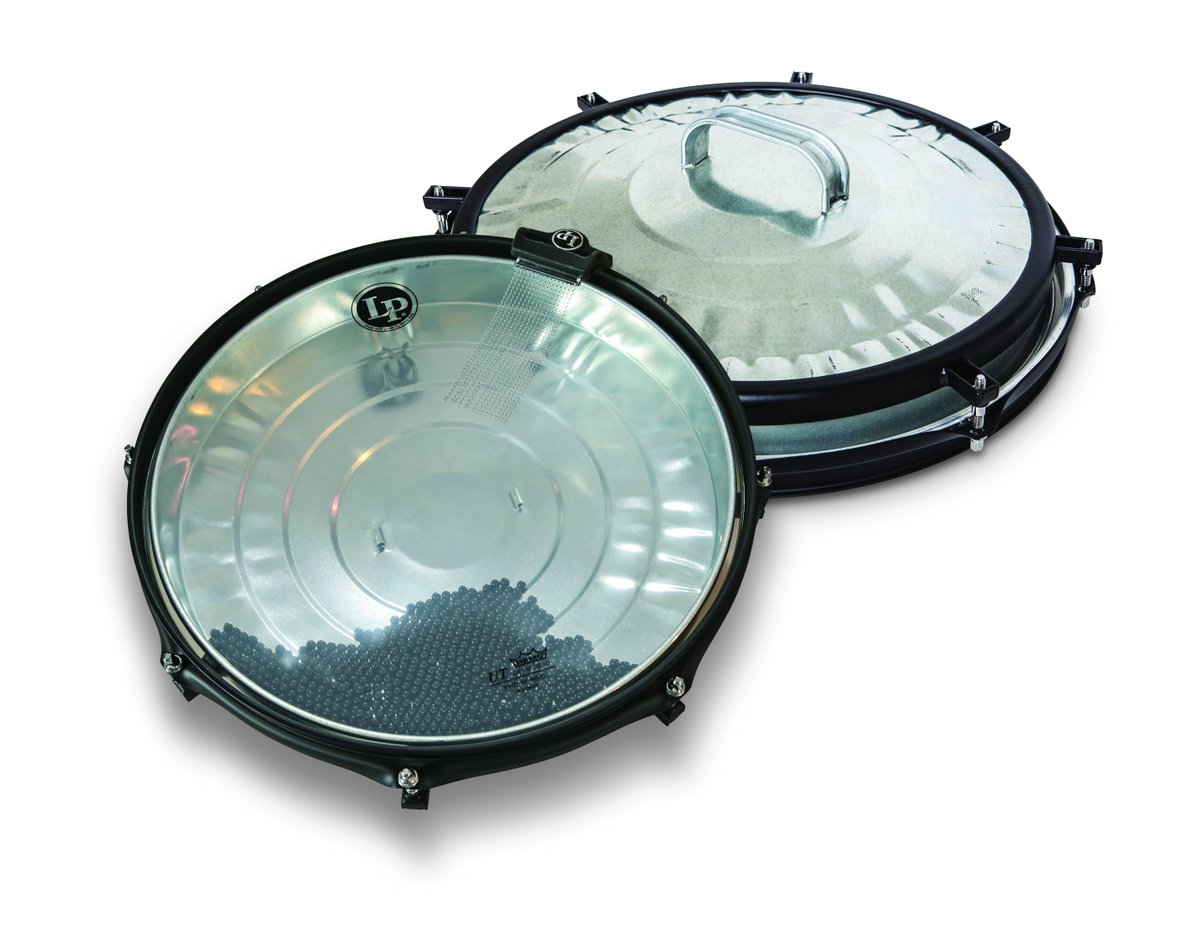 LPPercussion's tweet photo. The Trash Snare is a Swiss Army knife of drums. An included Snare Wire Sound Enhancer makes it a perfect side snare, Remove the wires for timbale sound. Loaded w/synthetic beads, itโs a massive shaker, ocean drum/sizzle effect. Play both sides! #lpraw #wearerhythm #lppercussion https://t.co/bMI8EZF4hF