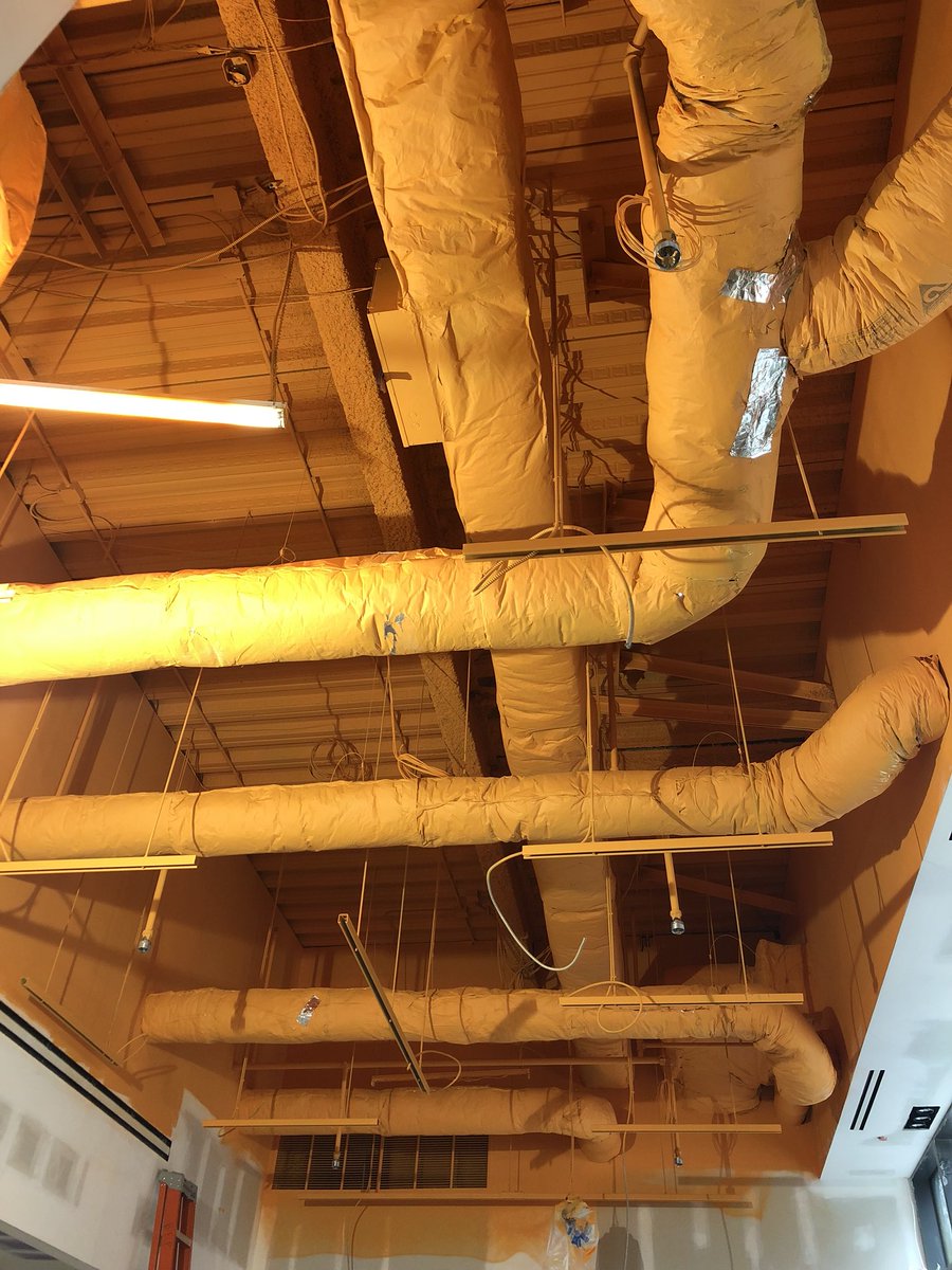 PremierMechLLC's tweet photo. Another new restaurant space nearing completion in the Seaport. No filter, it’s all orange up there. #premiermechanical https://t.co/F8NLbrfeG6