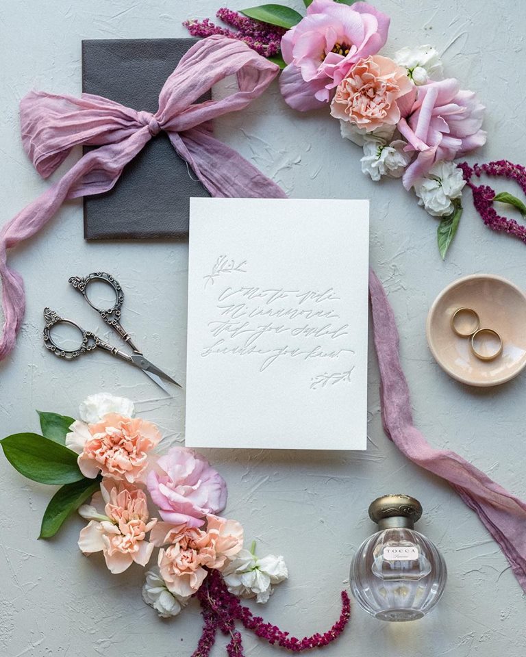 Give your wedding invitations a special touch with a spritz of Simone.

Photo by: ryanlindseyphotography