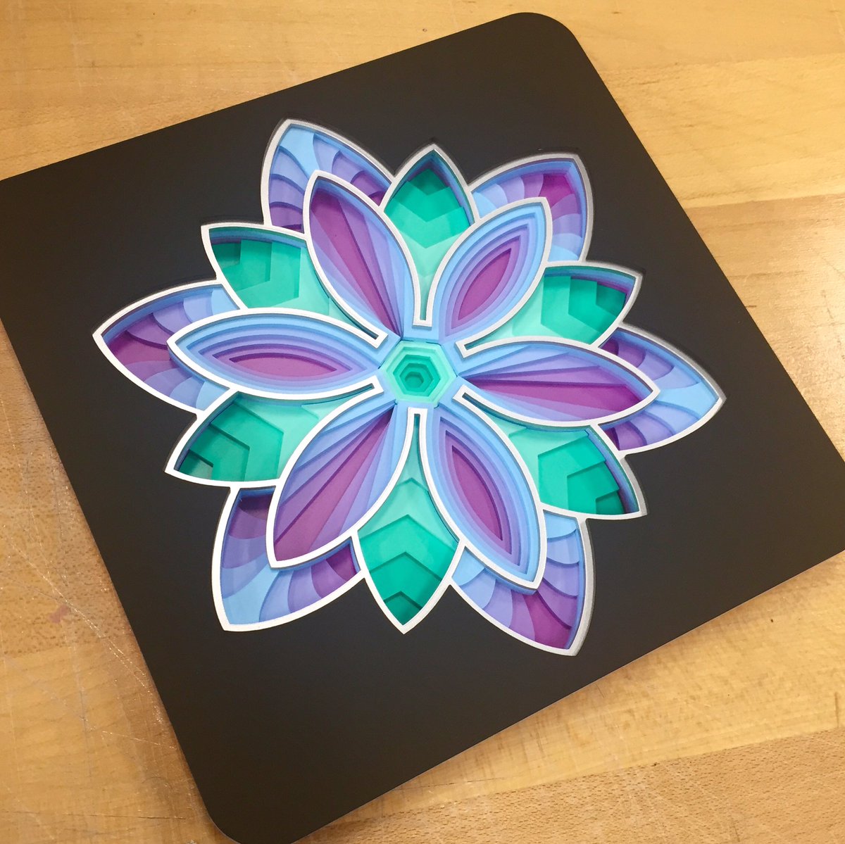 scbb11Sketch's tweet image. Finished upgrading my 3D flower design. 8 layers thick and 10 total colors! I'm liking the depth and also being able to see the colors on the sides. 
#glowforge #whatmadethis #lasercut 

Get up to $500 off your own @glowforge laser cutter ---&amp;gt; glowforge.us/gYxqdu