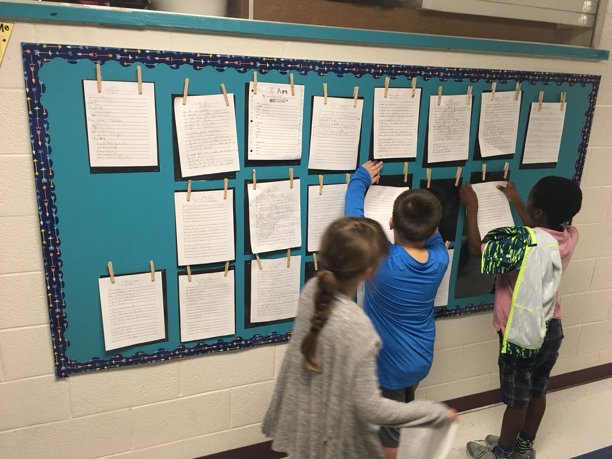 Getting our first writing pieces hung in the hallway! #thirdgradewriters #iampoems #lwpawpride