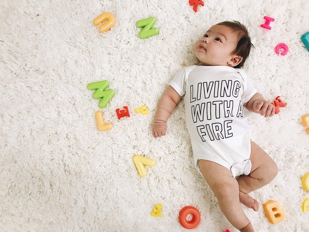 gracecitymsc's tweet photo. To celebrate our friends @jesusculture release of “Living With A Fire” this month - we are doing the last and final pressing of our LWAF shirts in ORANGE. Also introducing #LivingWithaFire BABY ONESIES 👶 Both available this Sunday at church ⛪️ #gracecitymusic https://t.co/63J2p7SNHP
