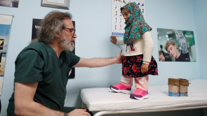 GlideWear's tweet photo. #TuesdayTalk Syrian girl who used tuna cans for legs receives prosthetic limbs and it's giving us all of the feels https://t.co/cl1XJfE7ex. https://t.co/NoQM6AIw1S