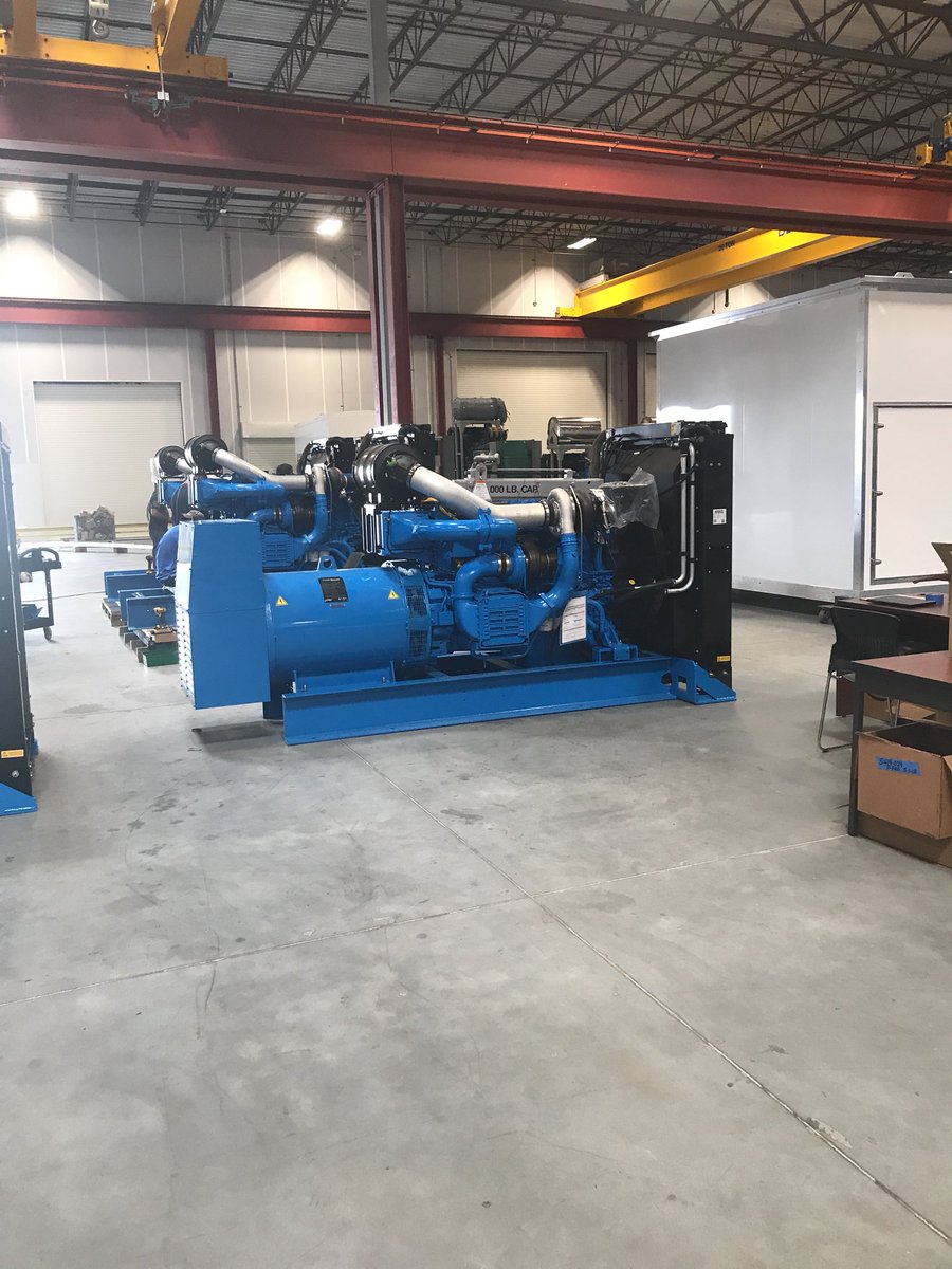 MrWolfTech's tweet image. Massive Volvo engines, a metal punch that looked like a sewing machine, wiring engineer at work and custom copper fabrication for extremely high grid level energy storage units. Our WMS students need to understand manufacturing is in the 21st century! #eastwakestrong  #EWStrong