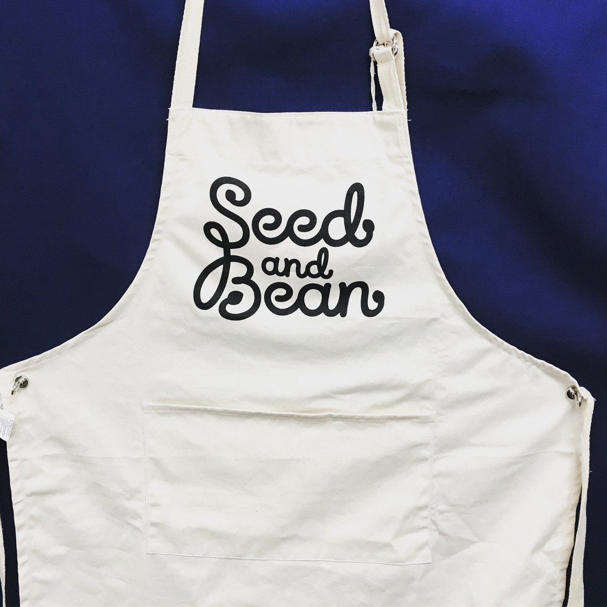 Fairtrade Cotton Custom Printed Apron for our customer @seedandbean #apron #customisedapron #printedmerchandise #fairtrade #cottonapron #chocolate