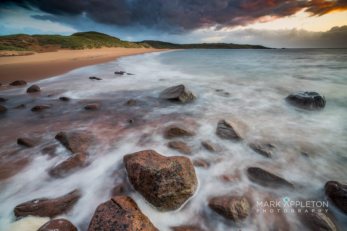 Not tweeted in a while. Thought I'd better change that! Red Point #beach under a dark cloud. #redpoint #Scotland