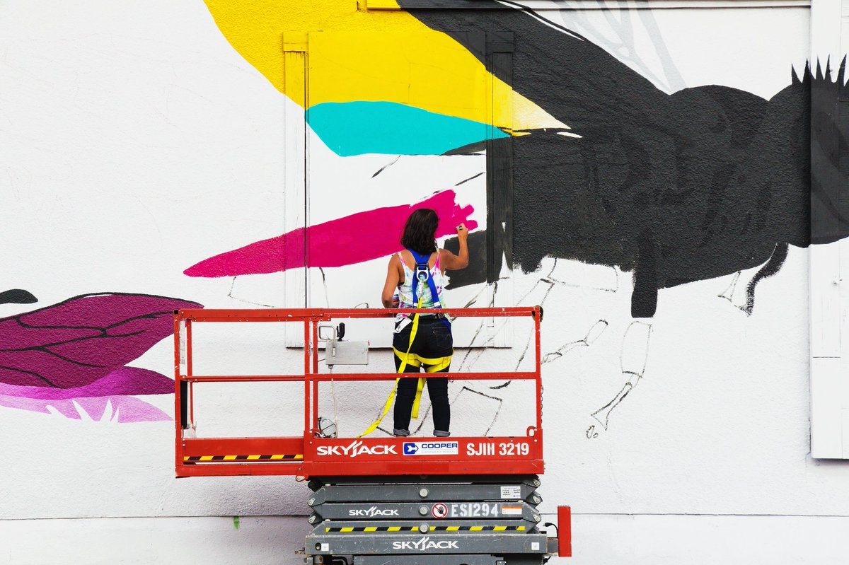 The colouring of the bees. 
Natalie Nehlawi at her wall on 12 St &amp; 10 Ave SW. 
Photo by Jennie Price
#yycbump #yyc #yycarts