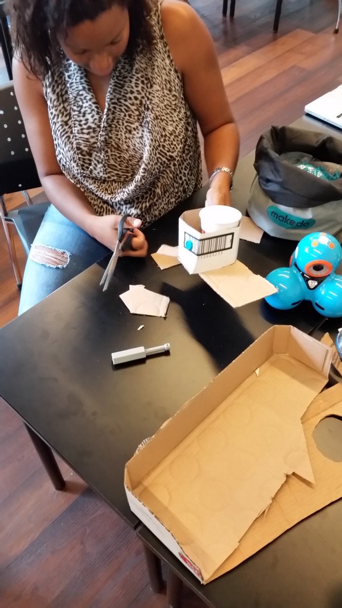 MrMcLain's tweet photo. Participants are hard at work knowledge building and coding either @Sphero or @WonderWorkshop dash to carry a cup a perimeter of 2.9 metres. Building contraptions with @Makedo and other found resources! @MrSteltman @Ruth_Daws #ETFOSA18 https://t.co/QdtHMQWu3F