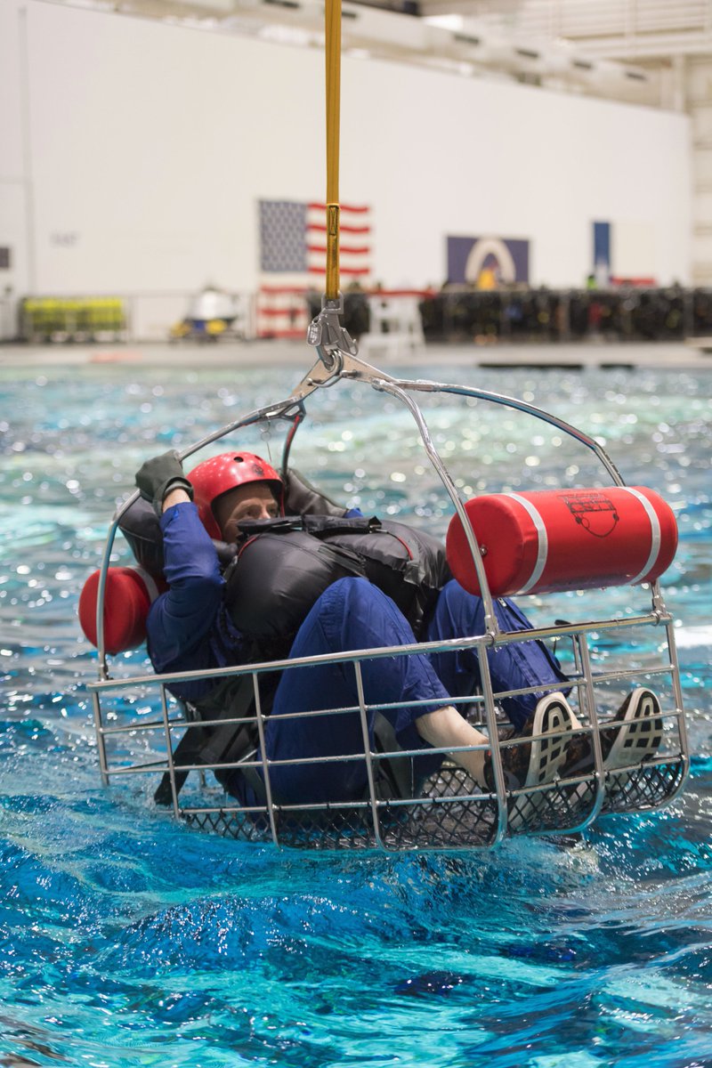 NASAJohnson's tweet photo. .@Commercial_Crew astronaut training is in full swing! @astro_josh and @Astro_Ferg undergo water survival training at our Neutral Buoyancy Lab. https://t.co/p9InvnBuRs