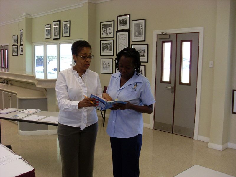 May Hinds working with clients to improve productivity and customer service.