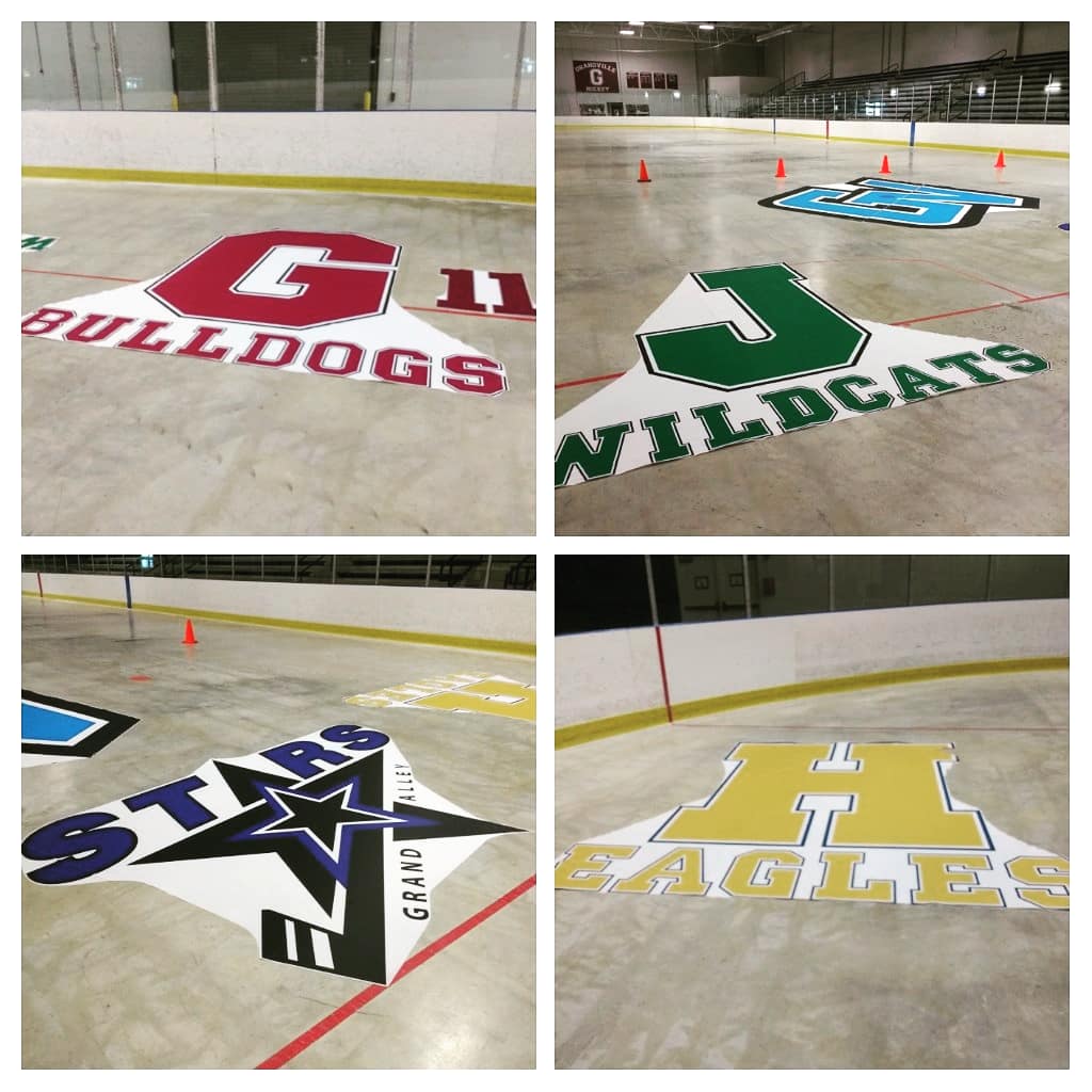 Look what we found out on the cement tonight!  Getting the wrinkles out of the logos.  Hockey season is getting closer!