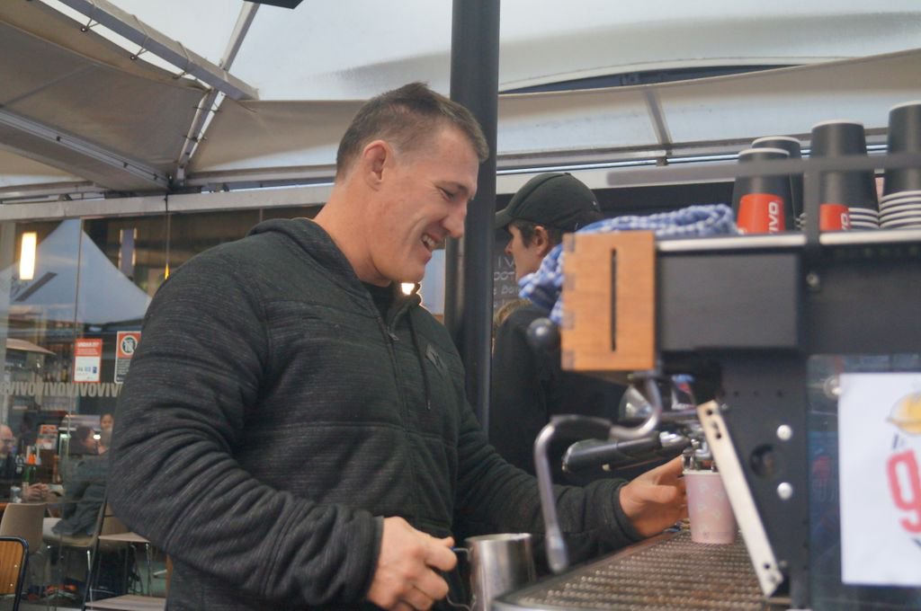 Clr_Angela's tweet photo. Yesterday @PaulGallen13 joined us @VIVO_Cafe to make coffee | Raising money for @aussiehelp - Paul was a popular barista! | Lucky to have good friends at Vivo | Remember tomorrow is our last day - come down and grab a #brewforabushie before we leave! https://t.co/yySjexnspc