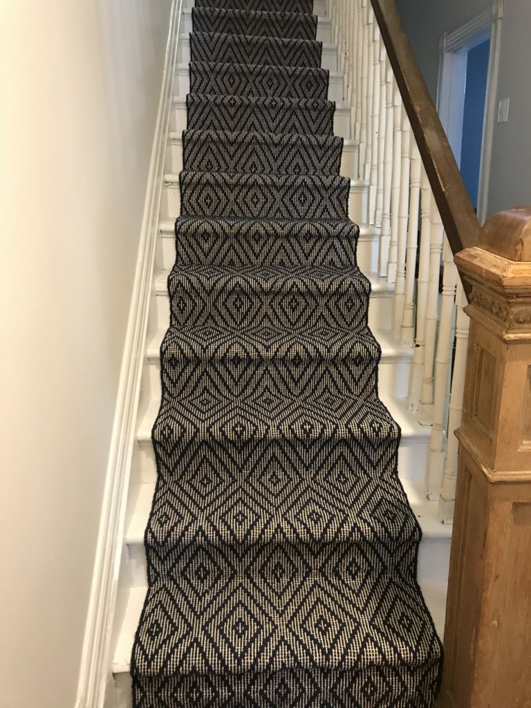 catherinegilb09's tweet photo. Out with the creaky red & green carpeted stairs and in with the bright white + runner! Railing & post yet to be stained. #workinprogress #butprogress!! #rowhousereno https://t.co/0pPStVtKhL