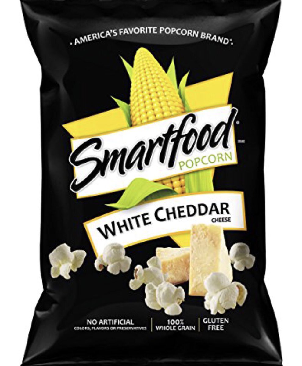 AmyKBetocrat's tweet photo. Whoever invented Smartfood is either someone with impeccable taste or Satan himself. #goingwithsatan #tvsnacks https://t.co/DR804uapI3