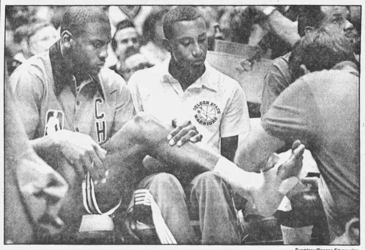 The look says it all. @chicagobulls trainer Mark Pfeil tends to the broken  foot that would keep 2nd year player Michael Jordan out of 64 games in the  1985/86 season. Jordan injured, image size:1200x821