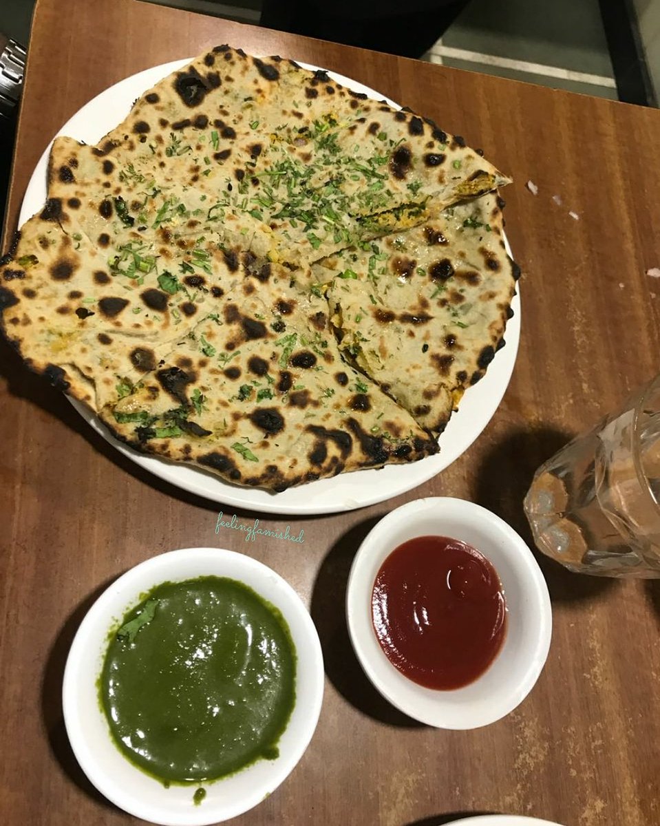 Our literal expression after looking at this-🤤no meal can be as comforting as this stuffed Paratha!😍
.
. 
#feelingfamished #famishedsouls #stuffedparatha #foodlove #paratha #love #foodiesforlife #rajendra #dahi #foodgram #foodgasm #asainfood #indianbread #chutney #cheese