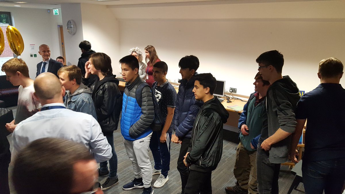 Students <a href="/BuryGrammar/">Bury Grammar School</a> waiting to collect their GCSE results this morning