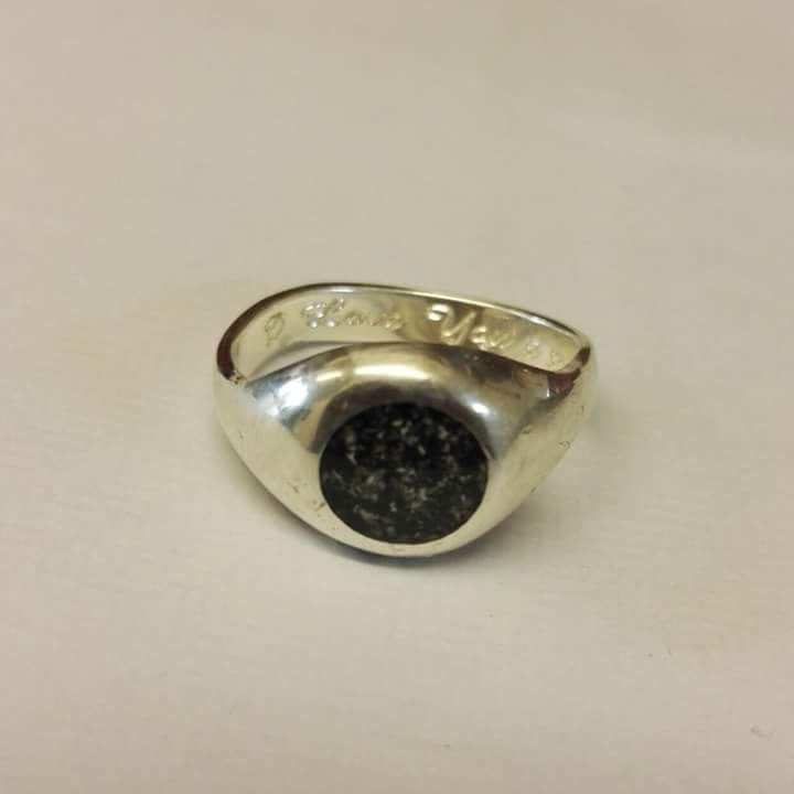 This ring was found by a mate of mine in a lay-by near Glenshiel in the Highlands. It's someone's ashes made into a stone and mounted in silver. Please give this a share and see if we can reunite it with the owner.