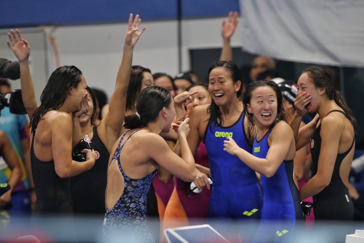 STsportsdesk's tweet photo. Sheer joy for #OneTeamSG and #HongKong after they claim a bronze and silver at the #AsianGames women's 4x100m medley relay following the shock disqualification of #China and #SouthKorea https://t.co/TGPGWCi780