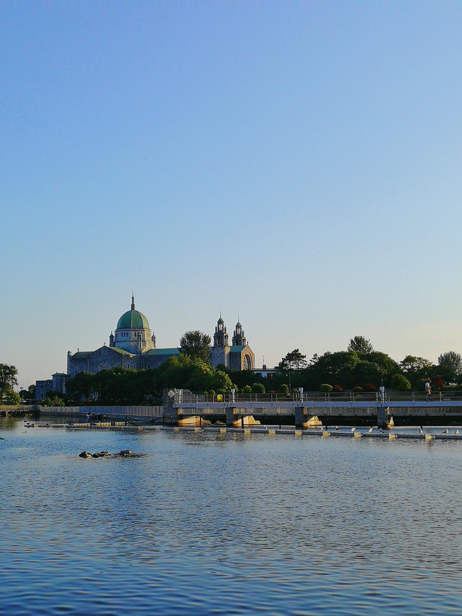 AtlanticIreland's tweet photo. Capturing our Cathedral in Galway from another perspective while relaxing near the Corrib river!
#atlanticlanguage #atlanticlanguageexperience #learnenglishwithus #studyenglish #studyenglishinireland #livingabroad #wildatlanticway #bluesky #irishsummer #studybreak https://t.co/aRXELTPYOf