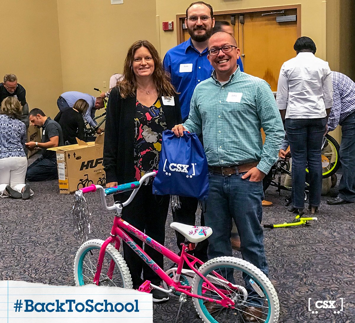 CSX's tweet photo. 25 students are headed #BacktoSchool with new bikes thanks to a partnership between CSX’s Real Estate and Facilities Management Team and Family Support Services of North Florida. #TeamCSX assembled each bike and supplied backpacks, water bottles and bike helmets. #safetyfirst https://t.co/KMdeQ7V6yv