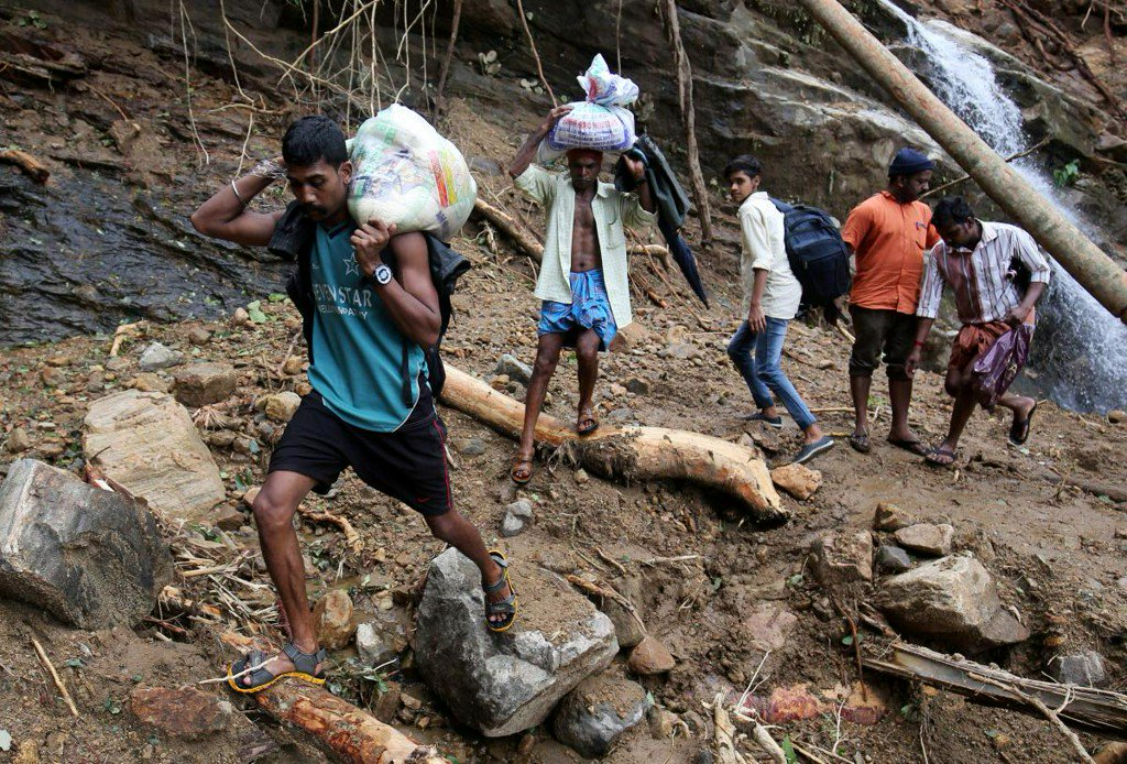 ReutersAsia's tweet photo. India decision to decline foreign aid for Kerala flood relief draws criticism https://t.co/M0XXlb1SKK https://t.co/BzOSexdYIP